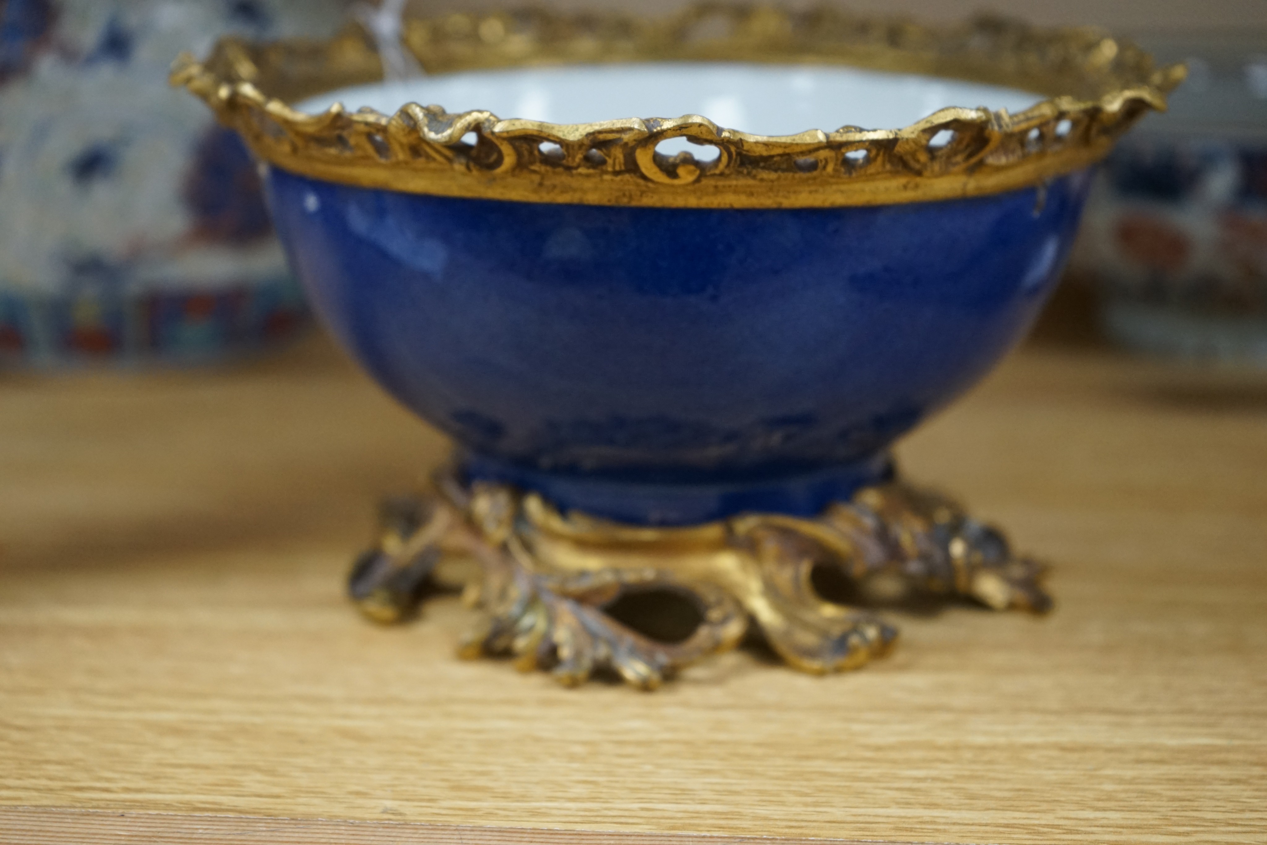 An 18th century Chinese clobbered blue and white bowl, a Samson powder blue ormolu mounted bowl, 19.5cm wide and a 19th century Chinese doucai style jar